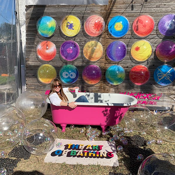 Me, sitting in a pink bathtub at an installation at SXSW.